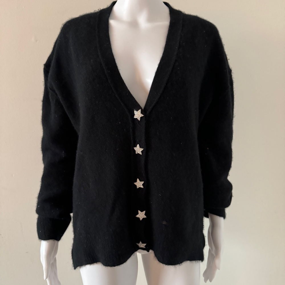 Black sweater with star buttons